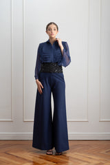 Blusa de organza azul con volantes