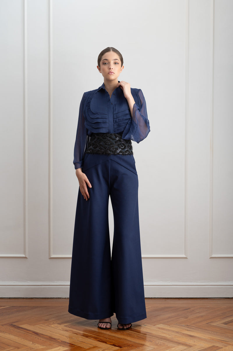 Blusa de organza azul con volantes