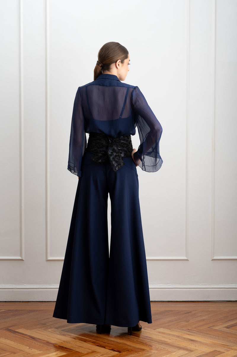 Blusa de organza azul con volantes