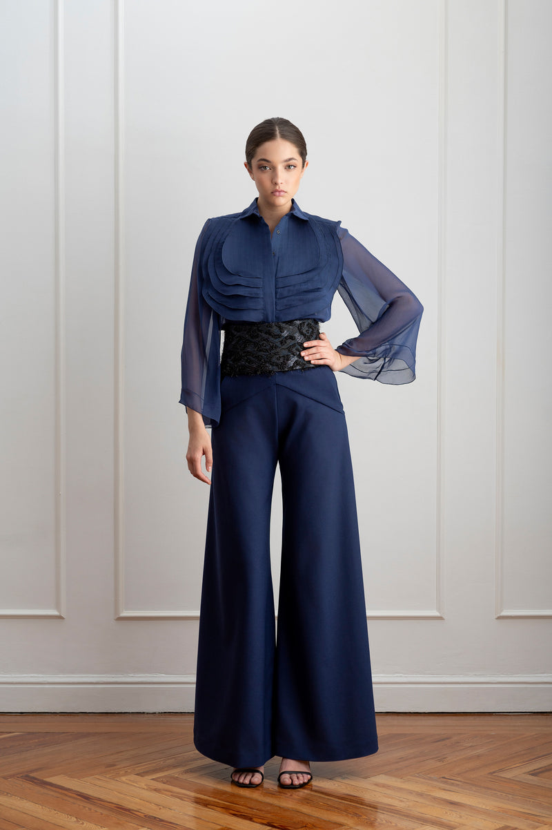 Blusa de organza azul con volantes
