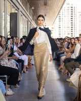 Falda larga dorada drapeada