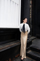 Falda larga dorada drapeada