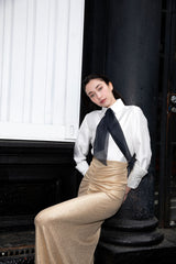 Falda larga dorada drapeada