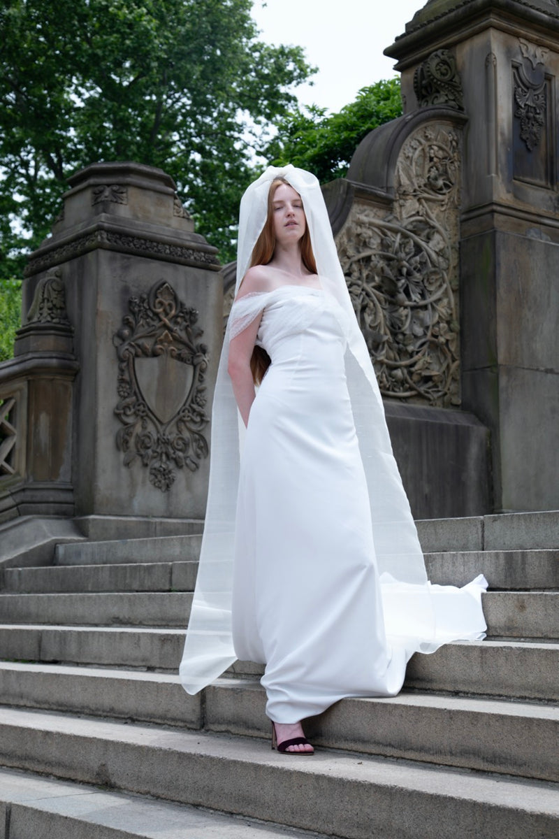 Dress in silk crêpe with crossed plumetis tulle straps and an open back