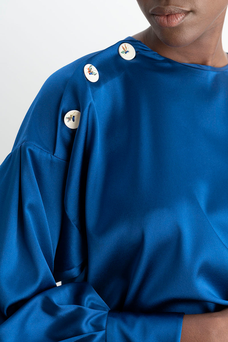 Detalles de los botones de la Blusa con Mangas Abullonadas Azul