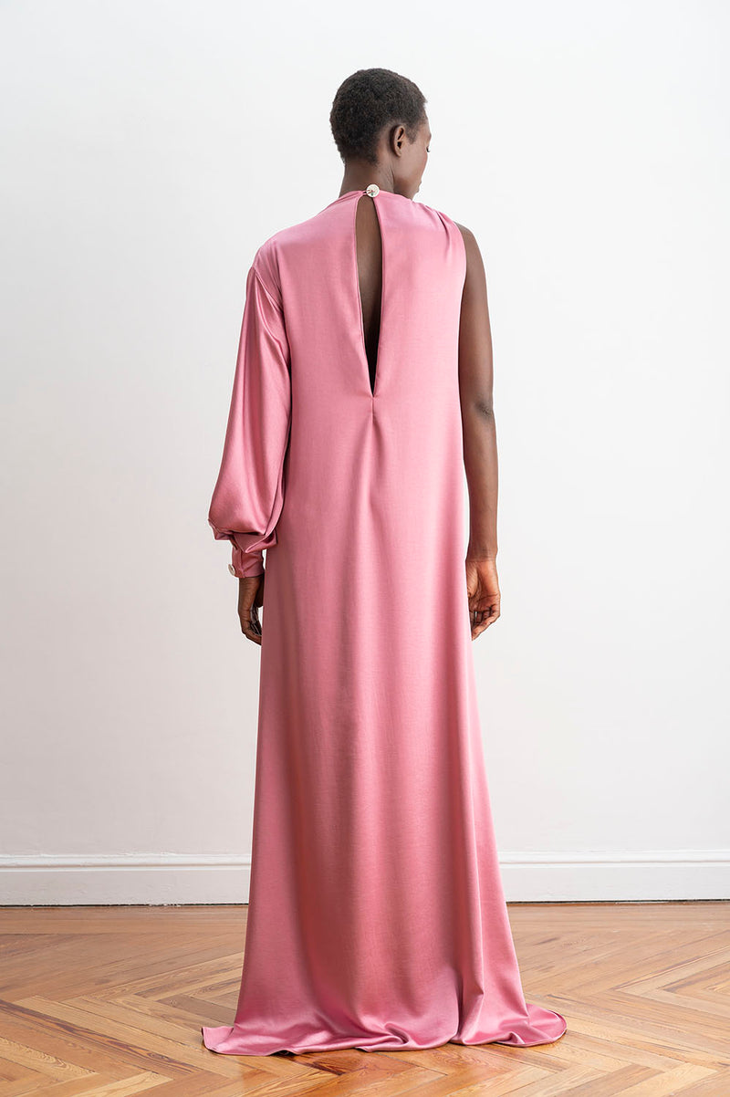 Espalda del vestido de noche asimétrico color rosa